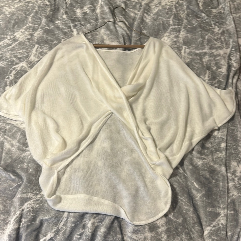 Very cute sweater wrap and has never been worn but has no tags still!